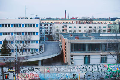 High angle view of buildings against clear sky