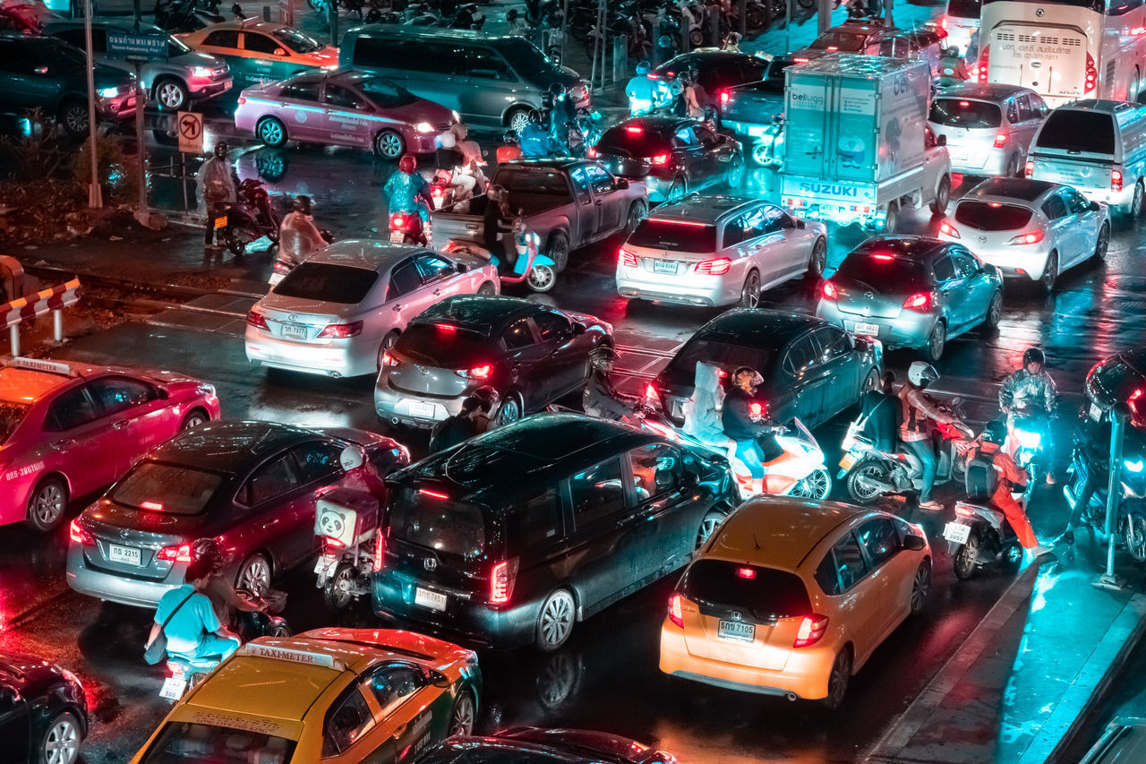 HIGH ANGLE VIEW OF TOY CAR ON STREET