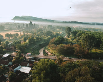 High angle view of trees and prambanan temple against sky