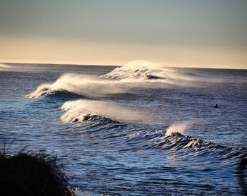 Scenic view of sea against clear sky