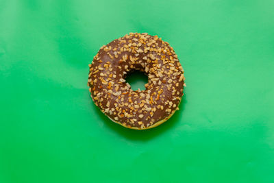 Directly above shot of bread on green background