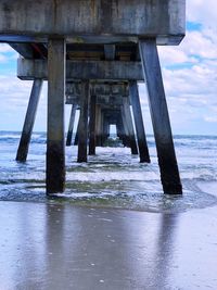 Wooden pier on sea shore