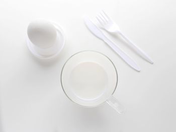 High angle view of empty coffee on table against white background