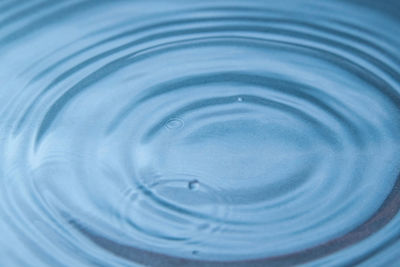 Full frame shot of blue water in glass