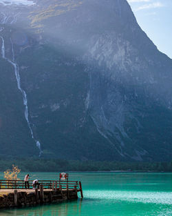 Scenic view of sea against mountains