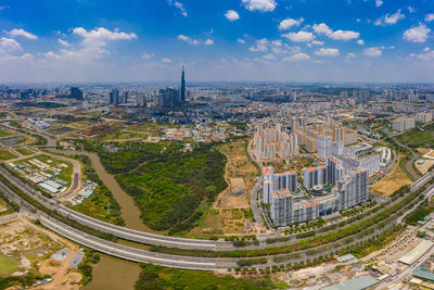 High angle view of buildings in city against sky