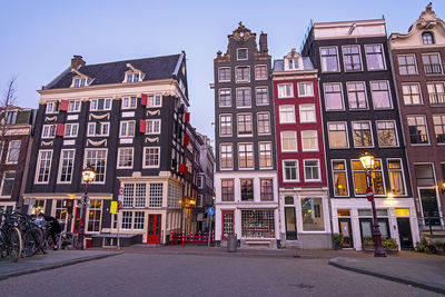 City scenic from amsterdam at the singel in the netherlands at sunset