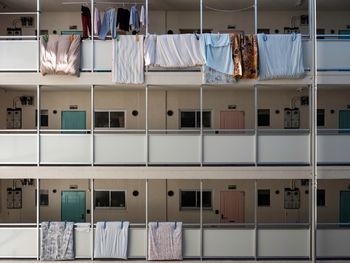 Clothes hanging in shelf