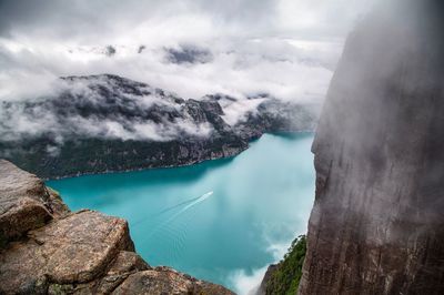 High angle view of lake against cloudy sky