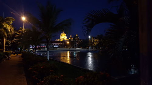 Illuminated swimming pool at night