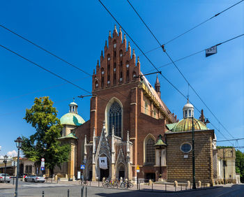 Low angle view of building against blue sky