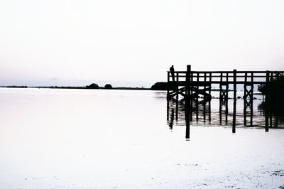 Scenic view of calm sea against clear sky