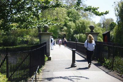 Full length of woman standing in park