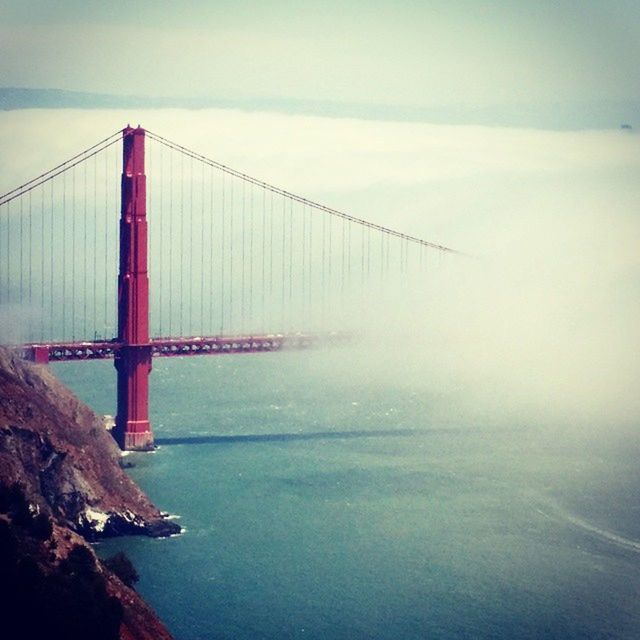 connection, bridge - man made structure, water, suspension bridge, engineering, built structure, architecture, sea, sky, transportation, golden gate bridge, bridge, river, travel destinations, waterfront, travel, tranquility, tranquil scene, famous place, tourism