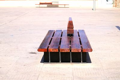 High angle view of empty bench in row