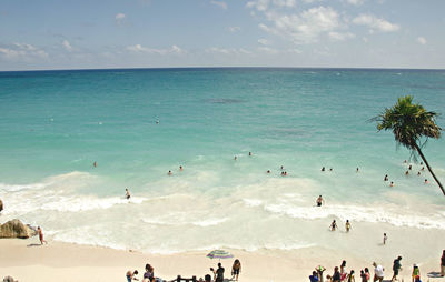 People enjoying at beach