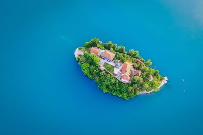 Aerial view of island amidst sea