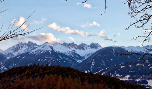 Scenic view of snowcapped mountains against sky
