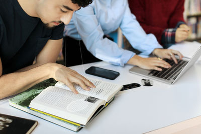 Young university students studying together