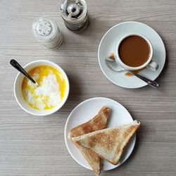 Directly above shot of coffee cup on table