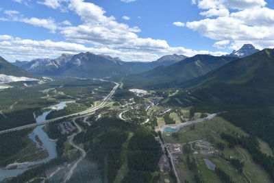 Aerial view of landscape against cloudy sky