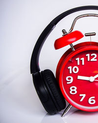 Close-up of clock against white background