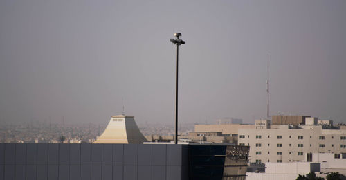 View of cityscape against clear sky