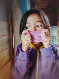 Portrait of a teenage girl drinking