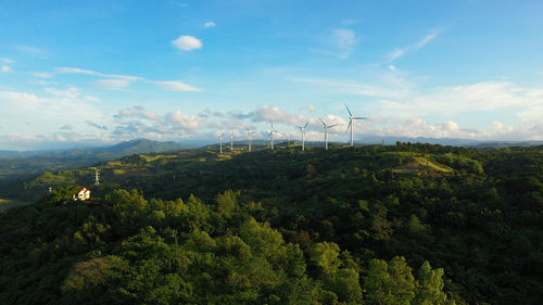 Aerial view of wind turbines and wind mills for electric power production in the philippines, luzon.