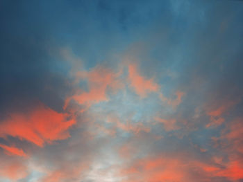 Low angle view of dramatic sky during sunset