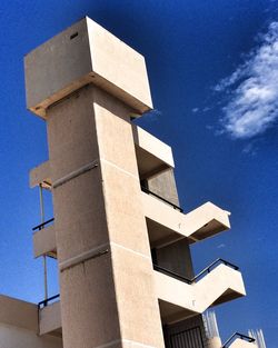 Low angle view of built structure against blue sky