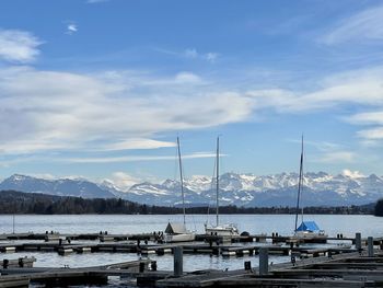 Boats moored at harbor, waiting for the spring