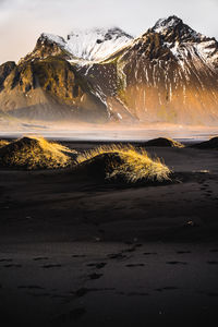 Scenic view of beach against mountain