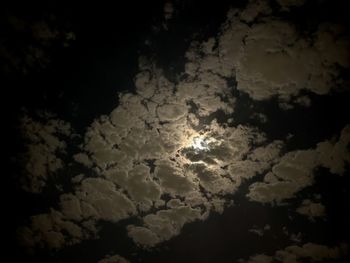 Low angle view of clouds in sky at night