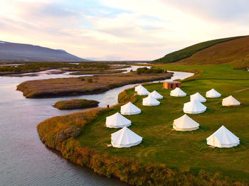 An aerial view of a tented camp in iceland