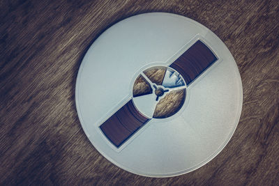 Tape recorder on a wooden background