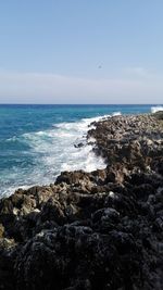 Scenic view of sea against clear sky