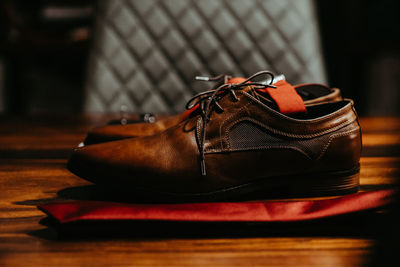 Close-up of shoes on table