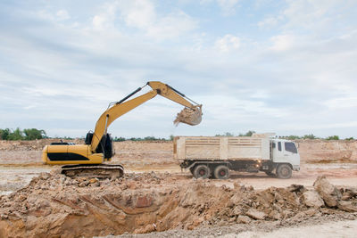 View of construction site on field against sky