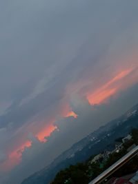 Low angle view of mountain against sky during sunset