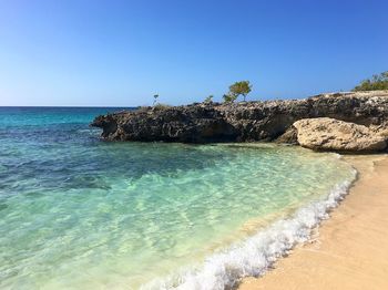 Scenic view of sea against clear sky