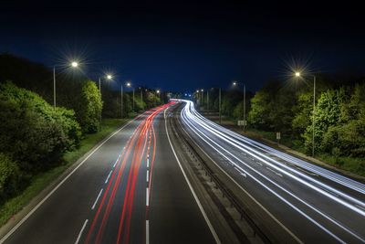 Light trails on road at night