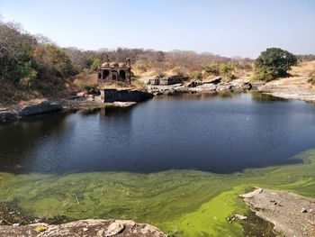 Scenic view of river against sky