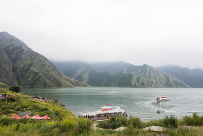 Scenic view of boats in lake