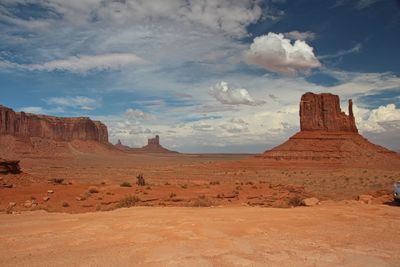 Rock formations on landscape against sky