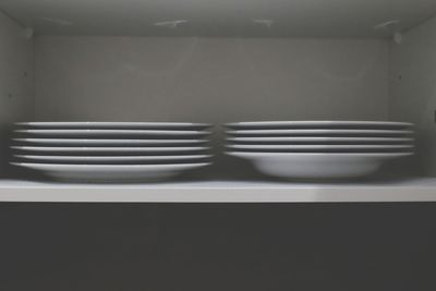 Close-up of empty chairs in kitchen