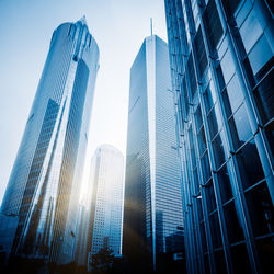 Low angle view of modern buildings against clear sky