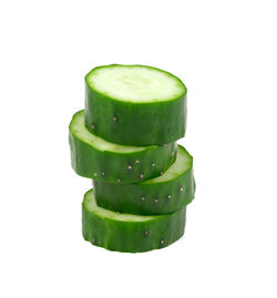 Close-up of green chili pepper against white background