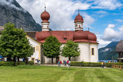 View of temple building against cloudy sky