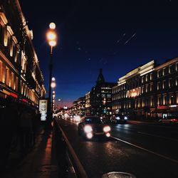 Traffic on city street at night